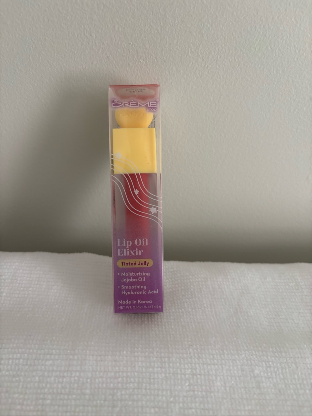 The Crème Shop Lip Oil Elixir Tinted Jelly shade flirty fuchsia